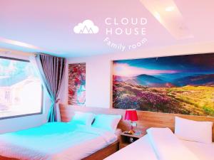 Postel nebo postele na pokoji v ubytování Cloud House Sapa