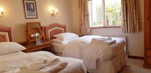 Voodi või voodid majutusasutuse Claremount House B&B toas