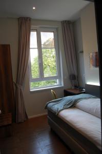 Voodi või voodid majutusasutuse Apollo Hotel Vienna toas