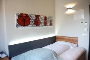 Voodi või voodid majutusasutuse Apollo Hotel Vienna toas