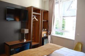 Voodi või voodid majutusasutuse Apollo Hotel Vienna toas