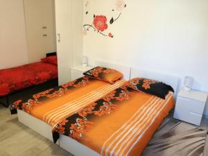 Postel nebo postele na pokoji v ubytování Vile Park Apartments