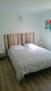 Кровать или кровати в номере La Ressourcerie « Marius »