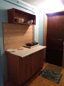 a kitchen with a counter top in a room at улица Прохоровская 12 квартира in Odesa