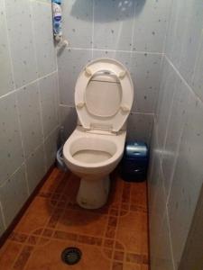a small bathroom with a toilet in a stall at улица Прохоровская 12 квартира in Odesa