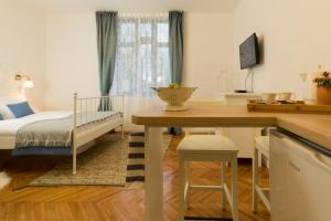 A television and/or entertainment centre at Villa Lenka