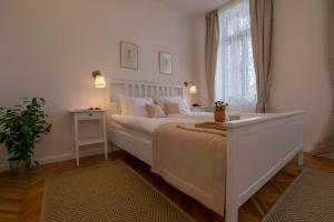 A bed or beds in a room at Villa Lenka