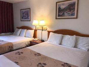 Postel nebo postele na pokoji v ubytování Americas Best Value Inn - Pendleton