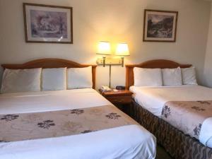 Postel nebo postele na pokoji v ubytování Americas Best Value Inn - Pendleton