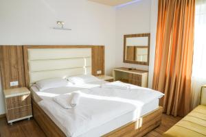 Ένα ή περισσότερα κρεβάτια σε δωμάτιο στο Apart Hotel Llolla