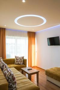 Μια τηλεόραση ή/και κέντρο ψυχαγωγίας στο Apart Hotel Llolla