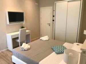 Postel nebo postele na pokoji v ubytování Hotel Vasco