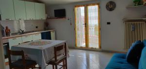 A kitchen or kitchenette at ADRIATICO 28 int.2 Még 3 kép