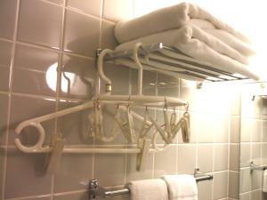 Koupelna v ubytování Bandai Silver Hotel + 31 fotografií