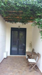 Patio nebo venkovní prostory v ubytování Villa Chris