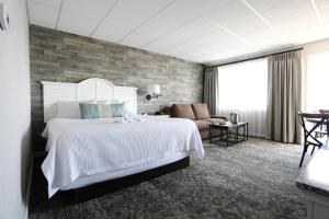 Säng eller sängar i ett rum på Grand Hotel Cape May