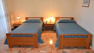 A bed or beds in a room at Hotel A-14