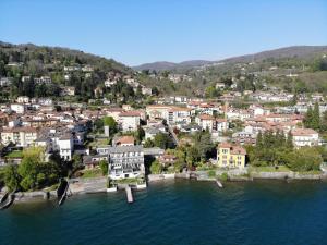 an aerial view of a town next to the water at Hotel Bel Sit in Meina +55 photos