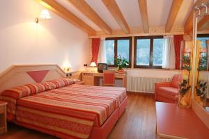 Postel nebo postele na pokoji v ubytování Hotel Regent's
