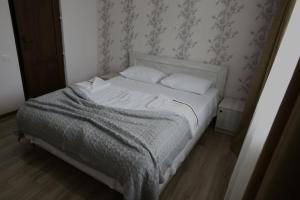 Voodi või voodid majutusasutuse Ia's Guest House toas