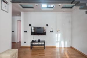 Televízia a/alebo spoločenská miestnosť v ubytovaní Casine 28 apartment