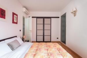Posteľ alebo postele v izbe v ubytovaní Casine 28 apartment