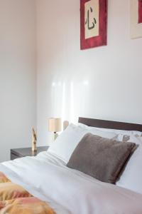 Posteľ alebo postele v izbe v ubytovaní Casine 28 apartment