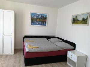 Postel nebo postele na pokoji v ubytování Apartmán Hugo
