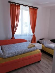 Voodi või voodid majutusasutuse Apartmán Hugo toas