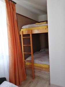 Postel nebo postele na pokoji v ubytování Apartmán Hugo