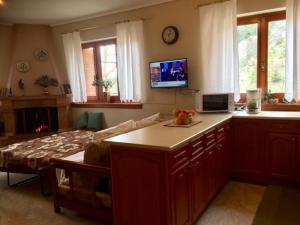 A television and/or entertainment centre at Mikro Katafygio