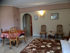 A bed or beds in a room at Mikro Katafygio