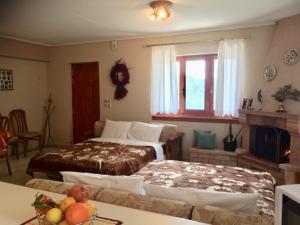 A bed or beds in a room at Mikro Katafygio