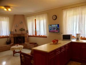 A television and/or entertainment centre at Mikro Katafygio
