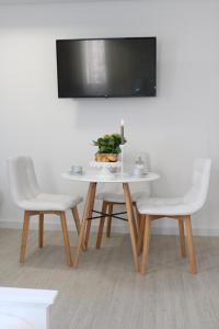 TV a/nebo společenská místnost v ubytování Trogir Square Apartment