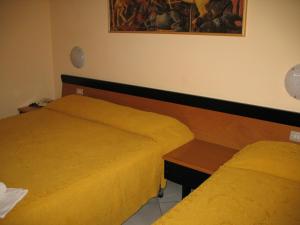 Cama o camas de una habitación en Albergo Paradiso