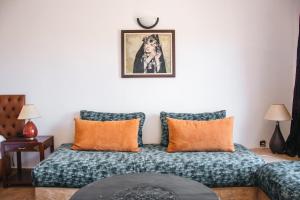 Postel nebo postele na pokoji v ubytování Ksar Shama