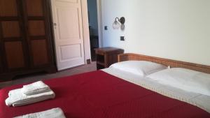 A bed or beds in a room at Villa Martelli