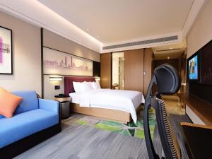 Μια τηλεόραση ή/και κέντρο ψυχαγωγίας στο Hampton by Hilton Guangzhou Dongxiaonan