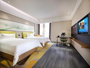 Μια τηλεόραση ή/και κέντρο ψυχαγωγίας στο Hampton by Hilton Guangzhou Dongxiaonan