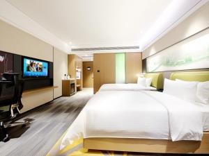 Μια τηλεόραση ή/και κέντρο ψυχαγωγίας στο Hampton by Hilton Guangzhou Dongxiaonan