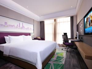 Μια τηλεόραση ή/και κέντρο ψυχαγωγίας στο Hampton by Hilton Guangzhou Dongxiaonan