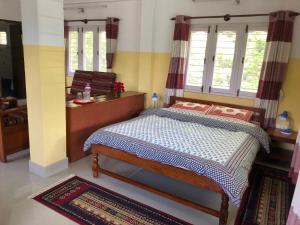 Katil atau katil-katil dalam bilik di Happy Sedi Lodge