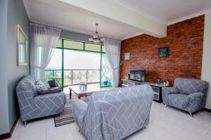 Zona d'estar a Fun Apartment @ Equatorial Hill Resort