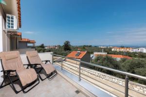 Balkón nebo terasa v ubytování Maria's Sea View Villa