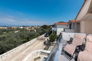 Balkón nebo terasa v ubytování Maria's Sea View Villa