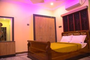 Voodi või voodid majutusasutuse SREE Kumaran Residence toas