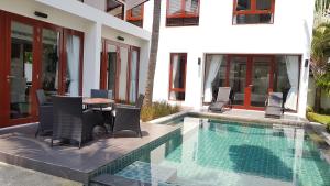 Bazén v ubytování Pranaluxe Pool Villa Holiday Home nebo v jeho okolí