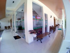 Area soggiorno di Amaryllis Guesthouse Syariah