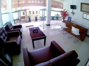 Posezení v ubytování Amaryllis Guesthouse Syariah